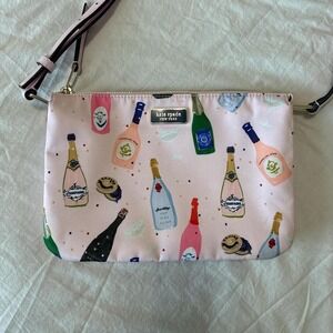 Pink Kate Spade New York champagne bottle bag